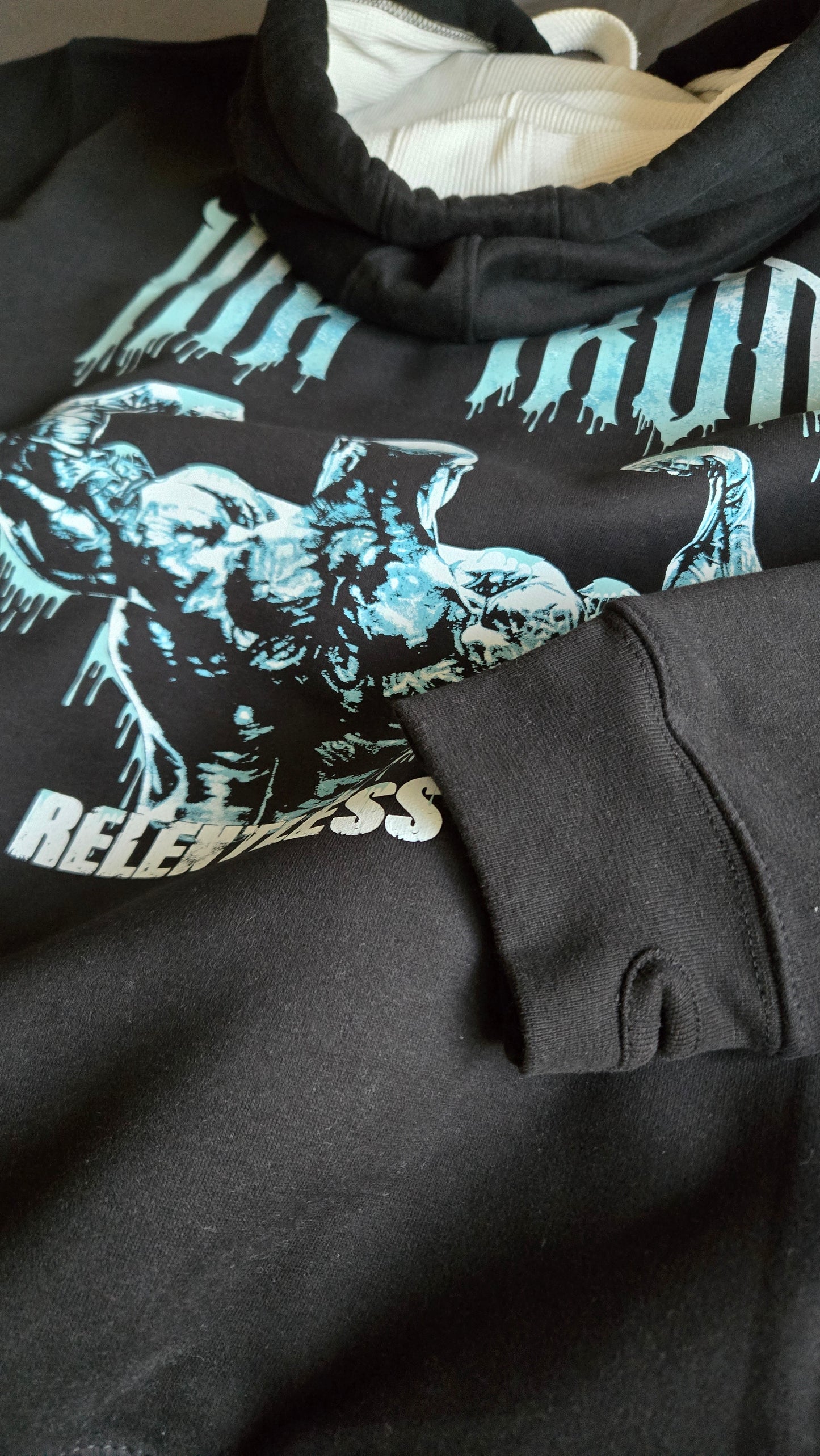 ELITE HOODIE DUSTY BLACK | ICE BLUE RELENTLESS