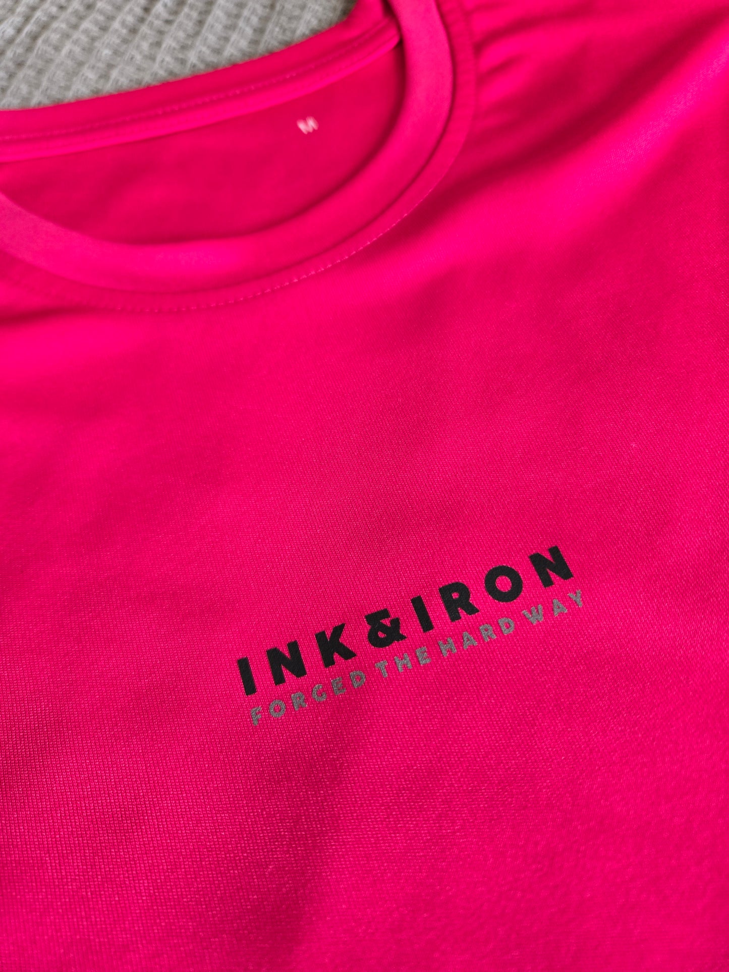 WOMENS STEALTH PERFORMANCE TEE - FORGED THE HARD WAY