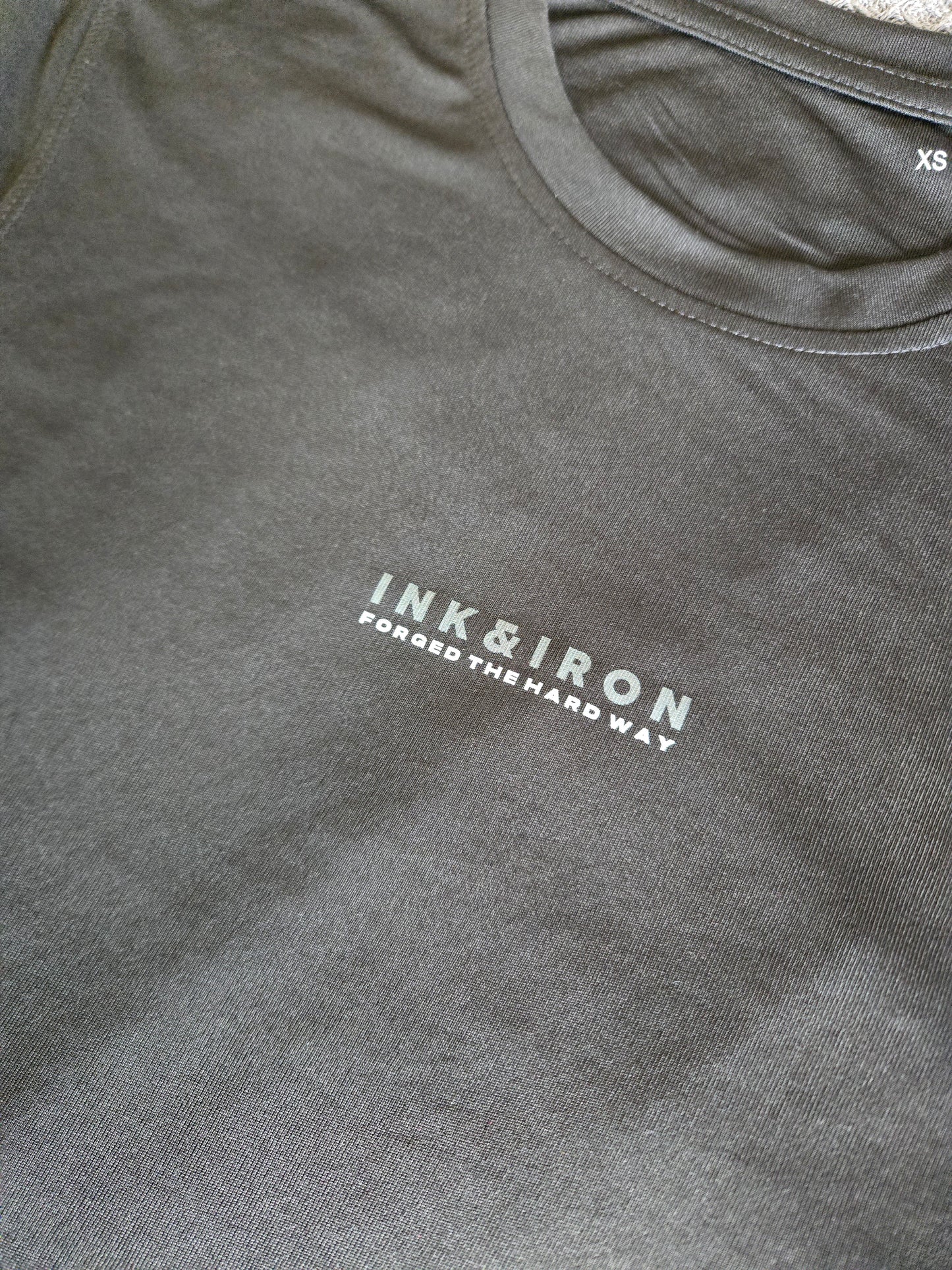WOMENS STEALTH PERFORMANCE TEE - FORGED THE HARD WAY